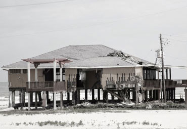 Wind damage - spray foam can help prevent uplift to Hampton roofs